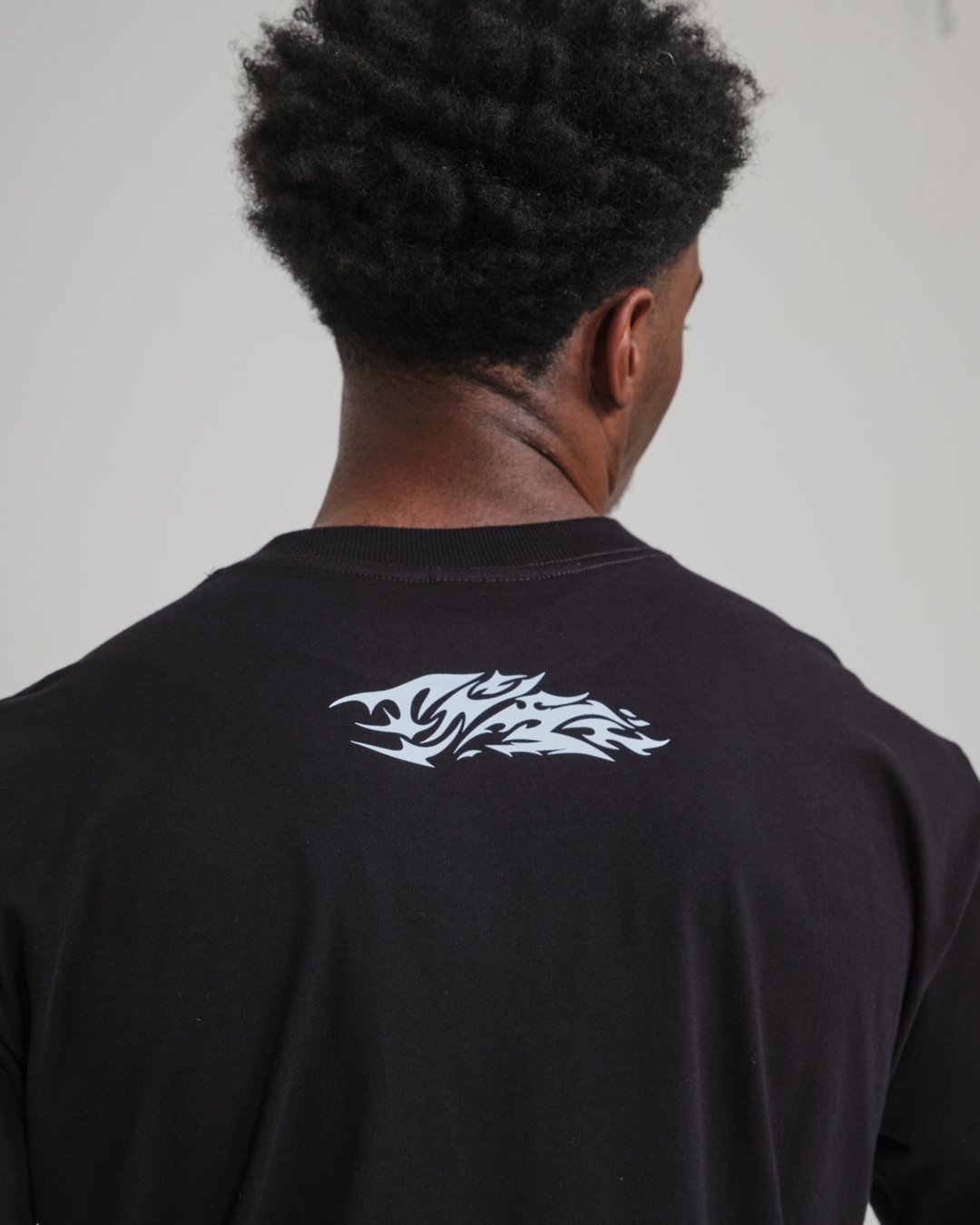 Camiseta Box Oversized Estampada Tribal - Preto