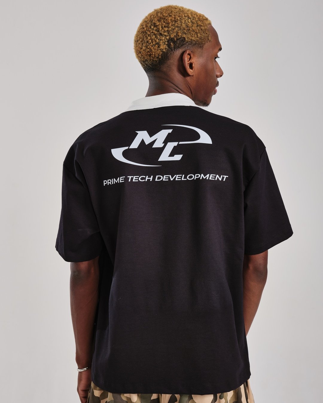 camiseta polo oversized prime preto